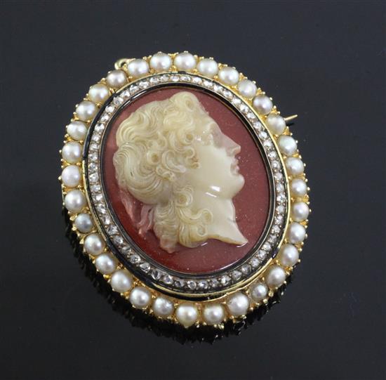 A 19th century gold, diamond and split pearl mounted oval hardstone cameo pendant brooch, 45mm.